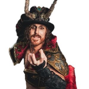 Crowley wears an ornate hat with horns alongside ornate shoulder pads and gauntlets