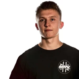 Josh wearing a black t-shirt with the win logo on the chest