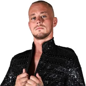 Joey Scott wearing a black sparkly jacket.