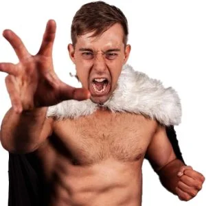 Thomas James Sky has fur and a red cape on as one hand reaches out to you.