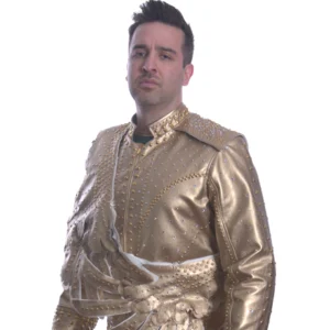 Sash is wearing a gold studded jacket with wings on the front