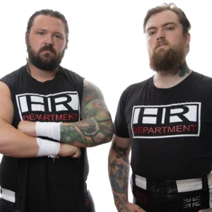 Razor and Jack Callahan The HR Department stood posed in their HR department t-shirts and wrestling gear.