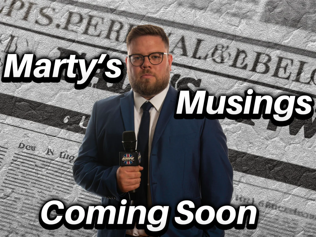 Marty Samuels stood in a blood suit jacket and tie holding a WIN microphone infront of a background that looks like news papers with the words Marty's Musings coming soon